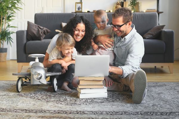 Happy Family with Laptop Mood